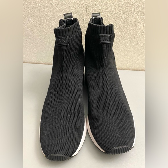 Michael Kors Shoes - Michael Kors  Elegant Black Women's High-Top Sneakers .Looks like new.
